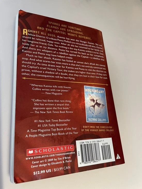 Catching Fire Paperback - Red Cover - Picture 2 of 2